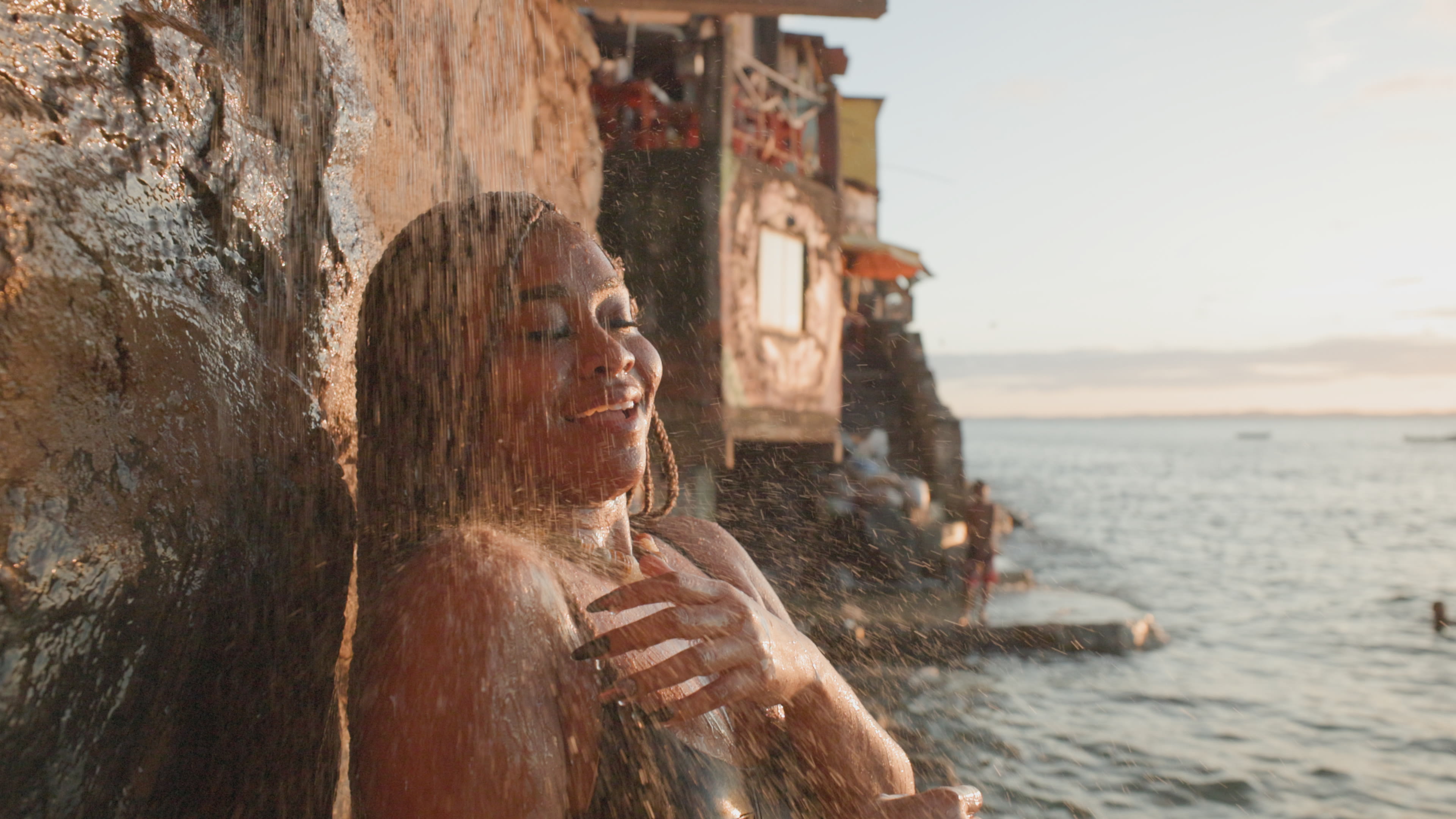 Golden hour waterfall bathing